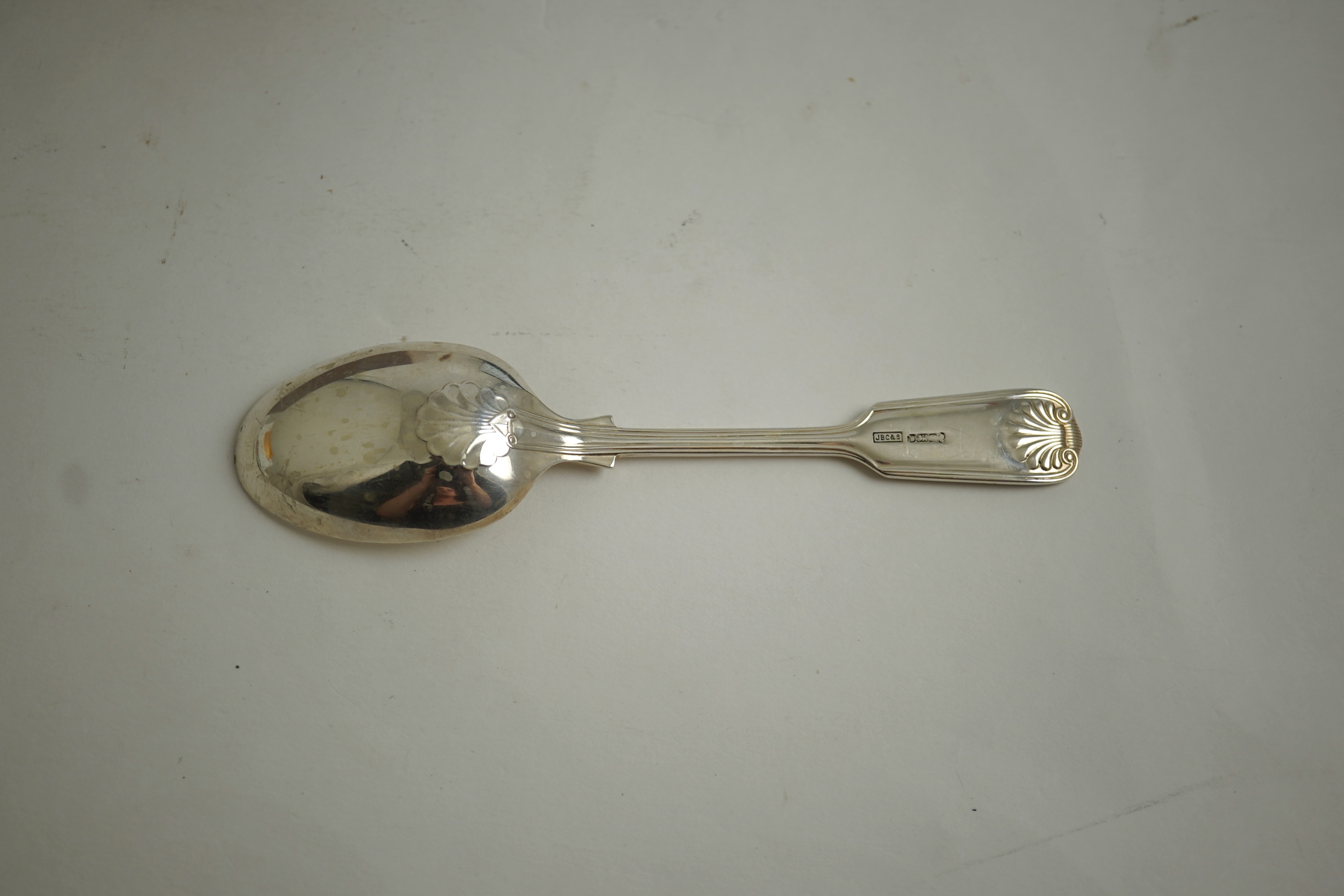 An Elizabeth II part canteen of silver fiddle, thread and shell pattern cutlery, by J B Chatterley & Sons Ltd